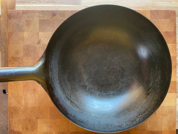 Cast iron skillet vs. a wok: what's the difference, and when to use both
