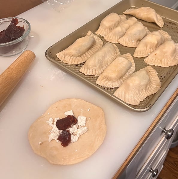 Filling empanadas